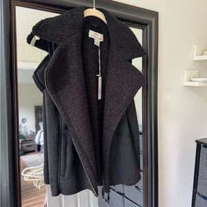 Black Sherpa-lined moto vest